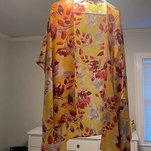 Beautiful floral poncho style cover up.